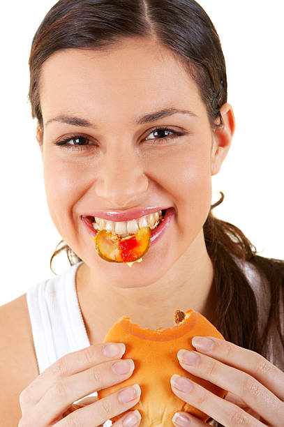 istock Woman Eating Burger 173920053