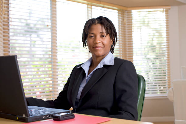 Smiling Businesswomen at the Office stock photo