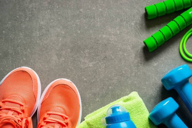 istock Fitness equipment at stone background top view. 1739215362