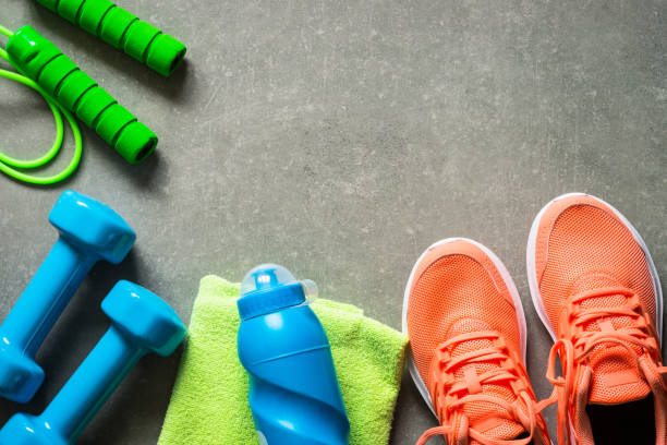 istock Fitness equipment at stone background top view. 1739215366
