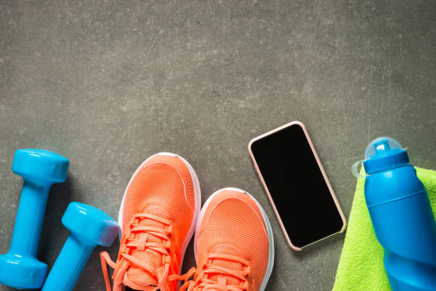 istock Fitness equipment at stone background top view. 1739215404