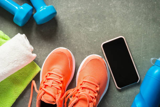 istock Fitness equipment at stone background top view. 1739215432