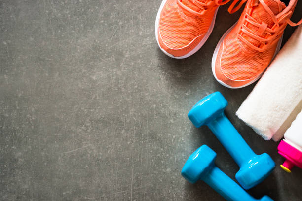 istock Fitness equipment at stone background top view. 1739215546