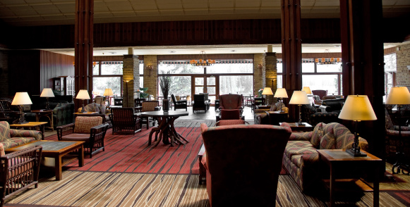 The main floor lounge and reading area in a mountain lodge and hotel. The Jasper Park Lodge.