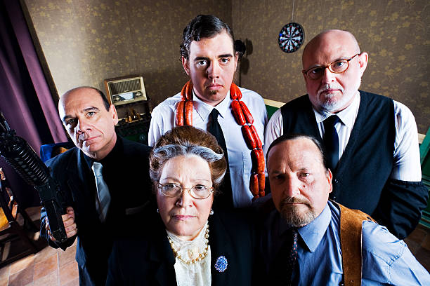 Family portrait of a bizarre looking mafia family. Man in the middle is wearing a sausage garland.