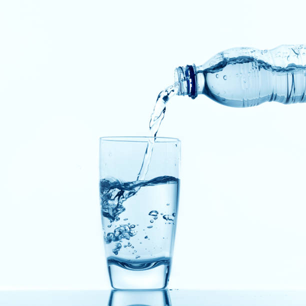istock Pouring water into a glass 173923074