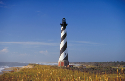 The 205 foot tall Hatteras tower is the ultimate symbol of lighthouses--timeless, powerful, and  enduring. It was built on the Outer Banks of North Carolina in 1870.