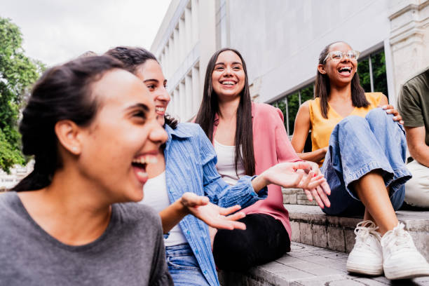 istock Young friends laughing while talking outdoors 1739235527