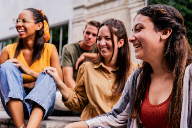 istock Young friends laughing while talking outdoors 1739235528