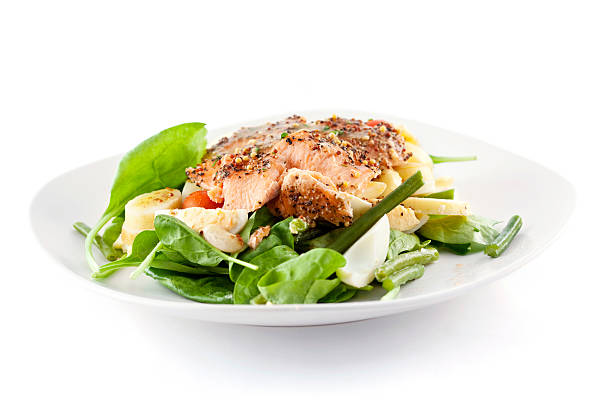 Roasted Salmon Salad Salad with delicious roasted smoked salmon. prepared potato photos stock pictures, royalty-free photos & images