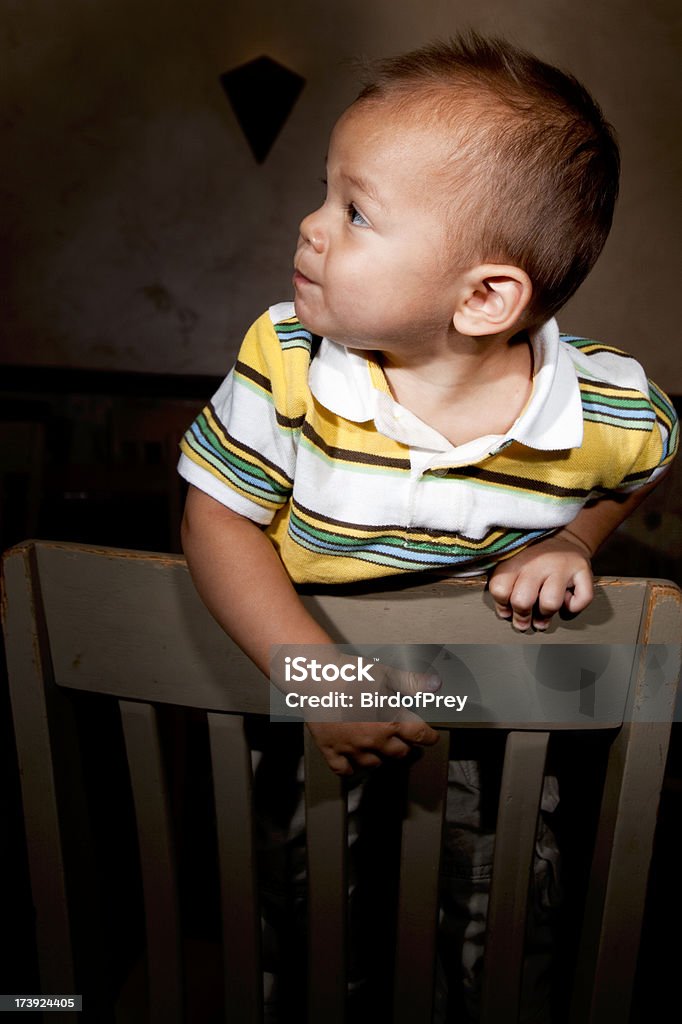 Young Hawaiian Child. A young Hawaiian child as he stands on a chair. Part of the Utah RedRockaLypse4 North. Hawaiian Ethnicity Stock Photo