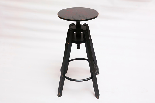 black colored stool on white background