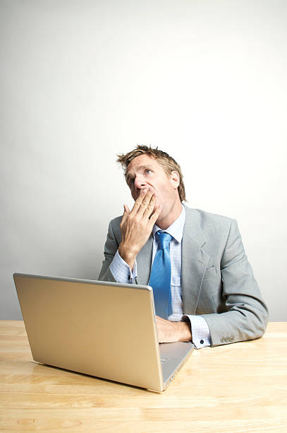 istock Office Worker Looks Up with a Yawn 173924663