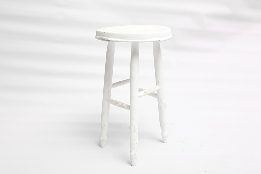 white colored stool on white background