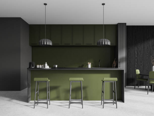 istock Gray and green kitchen interior with bar 1739249868