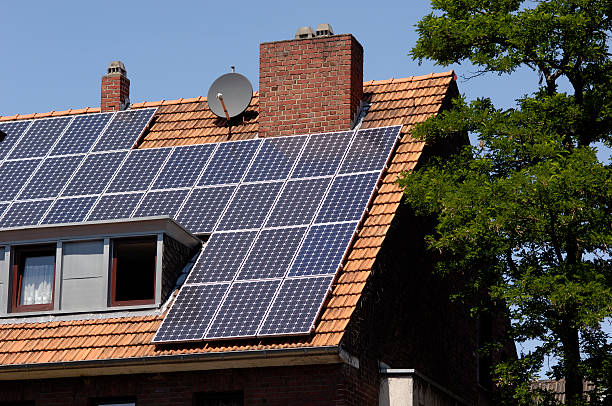 istock New solar panels on an older roof 173925629