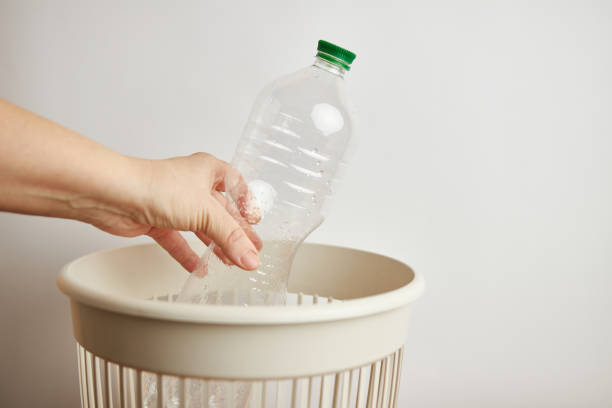 istock An empty plastic bottle is thrown away in a landfill for disposal and recycling 1739261166