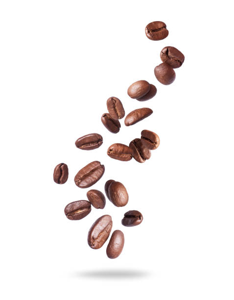 istock Coffee beans scattered in the air isolated on a white background. Falling coffee beans on white space 1739261168