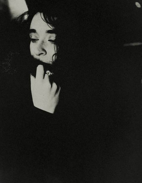istock The young woman in the dark. 1739268649