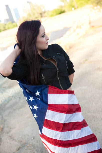 istock Girl wrapped in flag 173926920