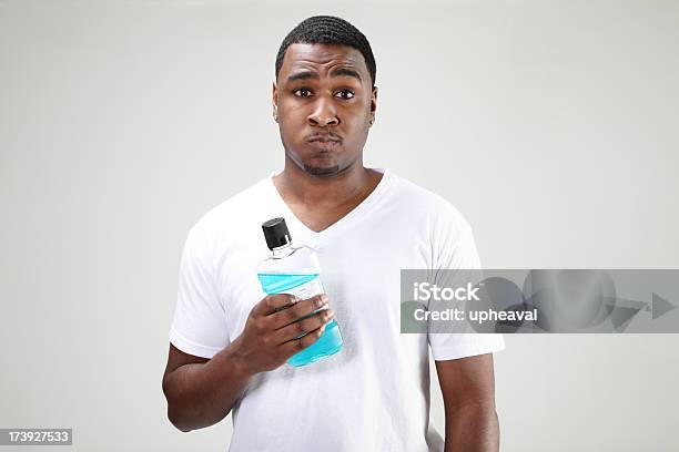 Mouthwash Stock Photo - Download Image Now - Mouthwash, Men, African-American Ethnicity