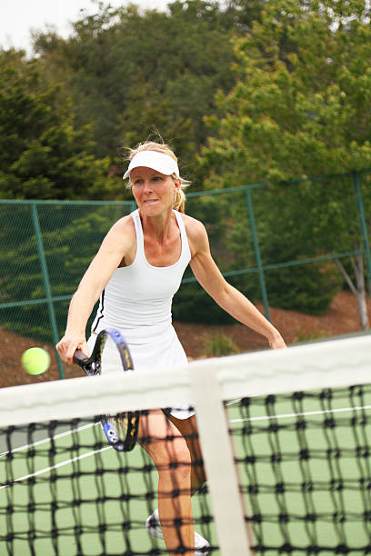 istock Tennis Player Returning The Ball 173927636