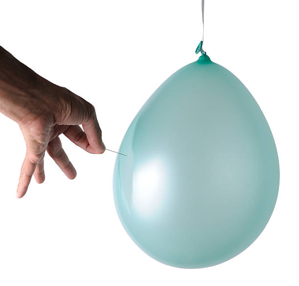 High-Speed Image: Popping Balloon with Pin stock photo