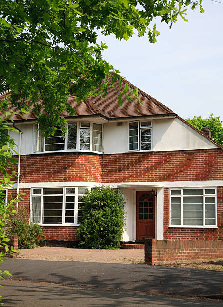 istock semi detached house in suburban London 173928092