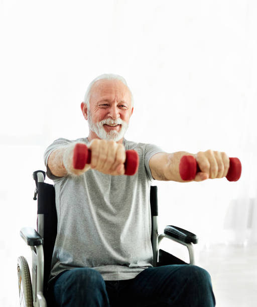 istock senior care exercise physical therapy exercising help assistence retirement home physiotherapy physiotherapist fitness gym strech band clinic therapist elderly man 1739281331