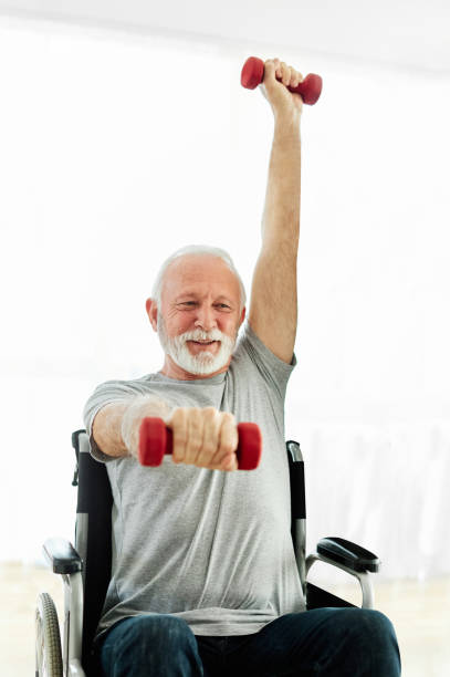 istock wheelchair senior man exercise physical therapy exercising retirement home elderly man dumbbell recovery 1739282426