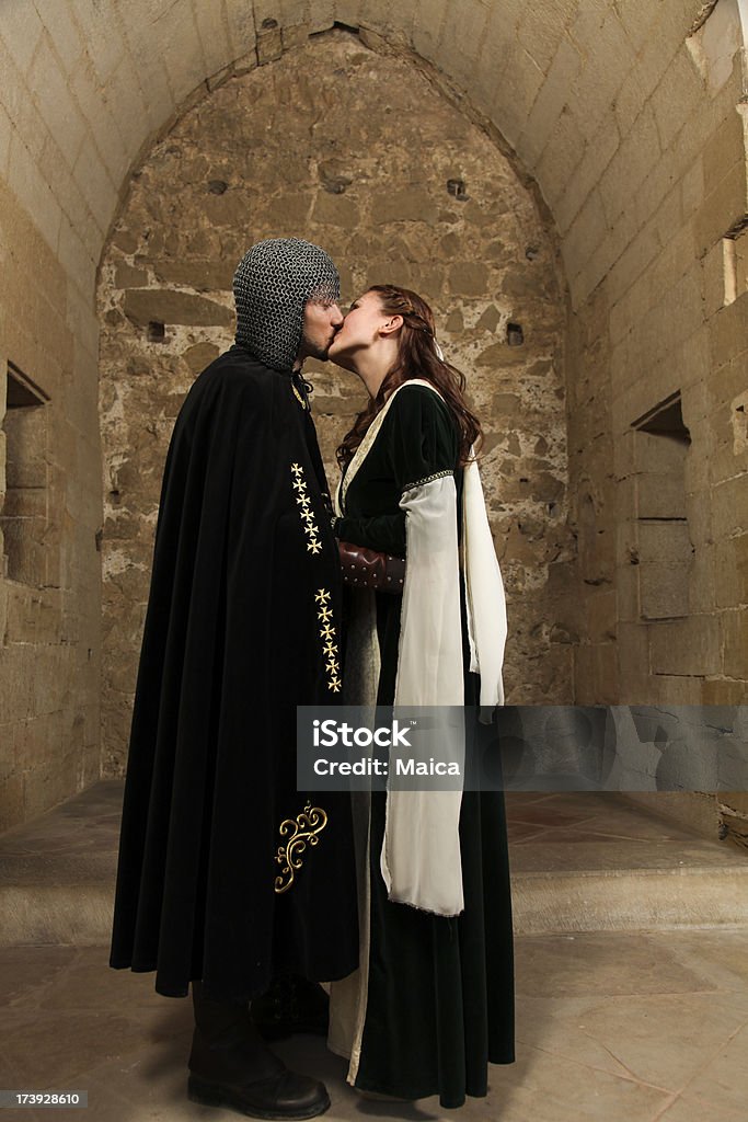 The perfect kiss Young medieval couple kissing each other. Medieval Stock Photo