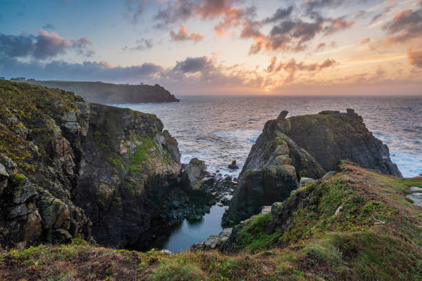 istock Beautiful dramatic Summer dawn over Lizard Point in Cornwall UK with lovely glowing sky and clouds 1739313335