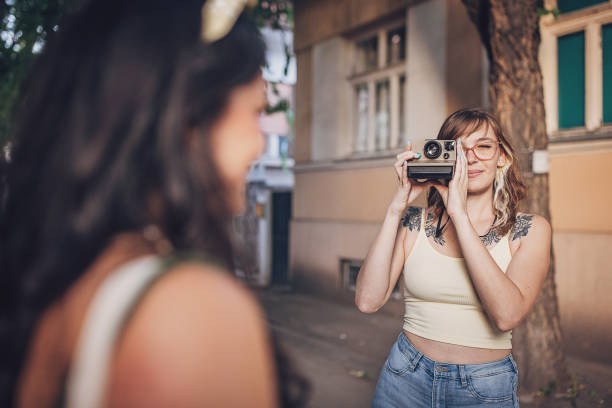 istock Female friends in city 1739315949