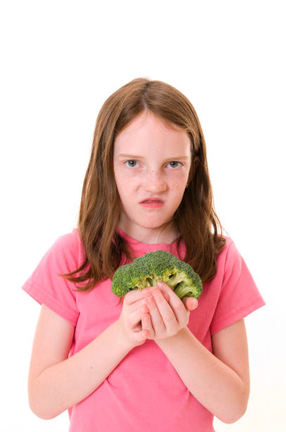 istock Pre-teen Hates her Vegetables 173931969