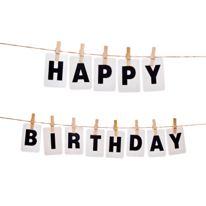 Happy Birthday written with letters hanging on clothespins isolated on white background.Please see some similar pictures from my portfolio: