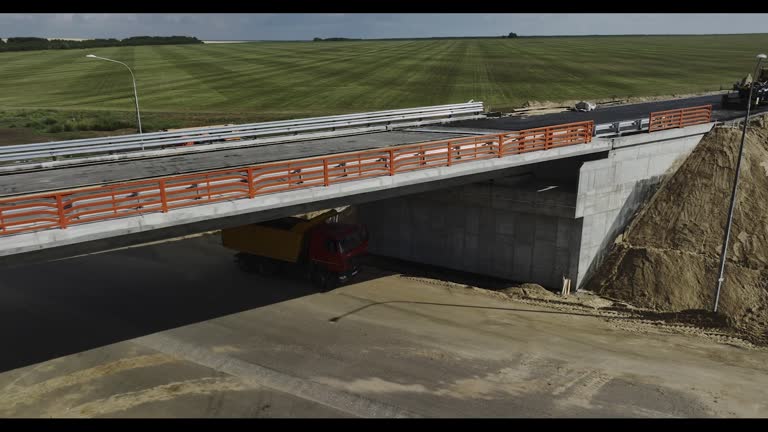 Road builders develop building of major road overpass bridge