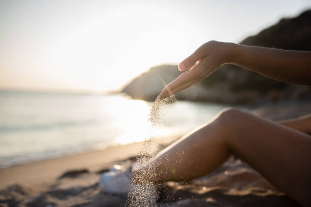 istock Hands playing with sand stock photo 1739331518
