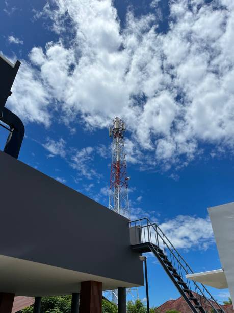 Stair ladder with a tower communication with blue sky in background