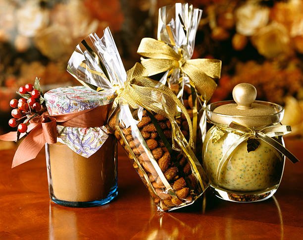 Jars wrapped for gifts of nuts and mustard.
