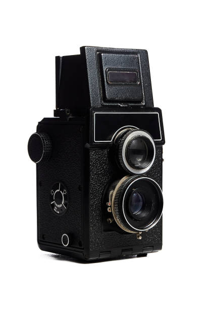 istock Vintage medium format camera with two lenses close-up on a white background, turned slightly sideways. 1739339294
