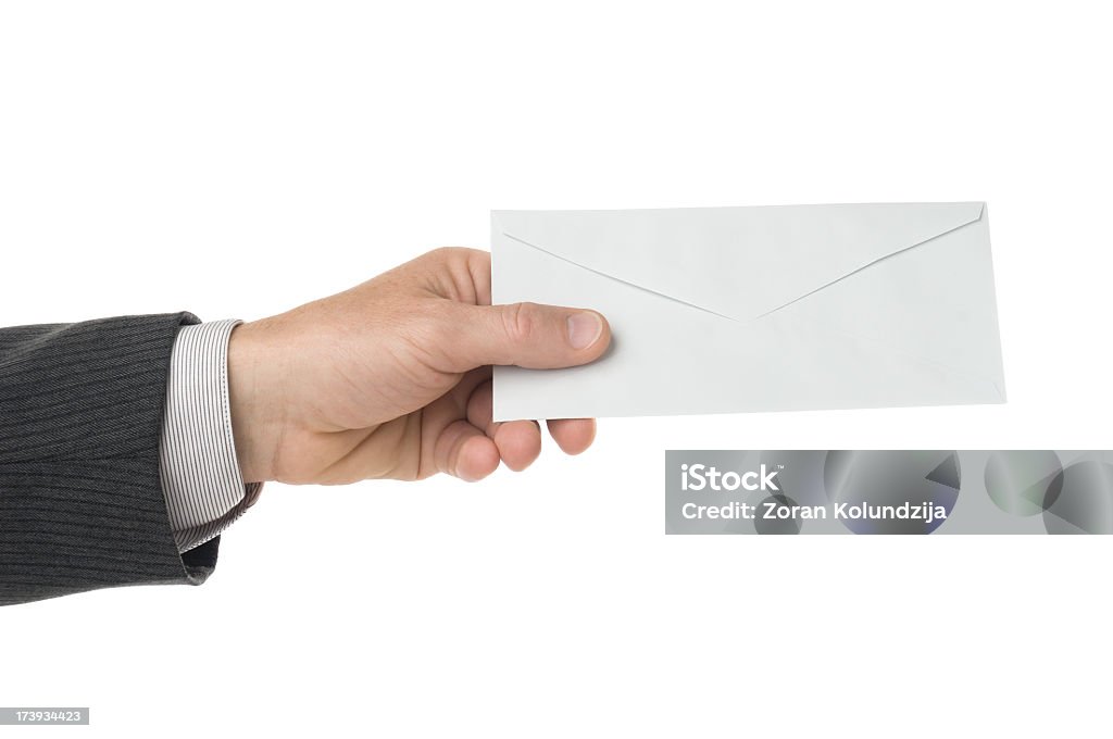 Main passant lettre isolé sur blanc - Photo de Enveloppe libre de droits