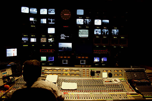 Television Control Room View of a television control room. All monitors have been altered or obscured. post production house stock pictures, royalty-free photos & images