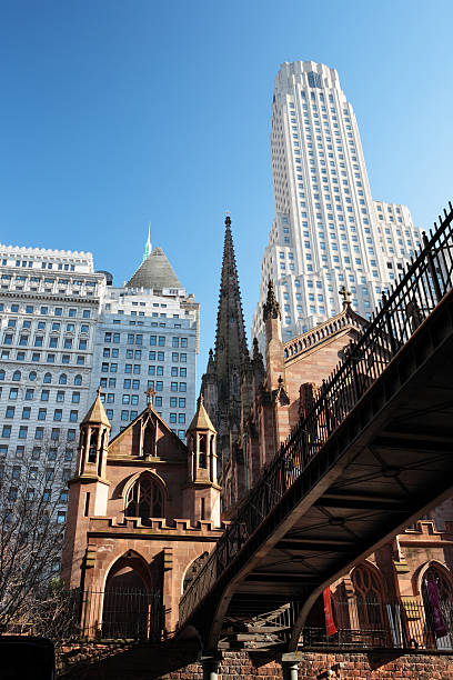 istock Trinity  church agaist modern buildings 173935046