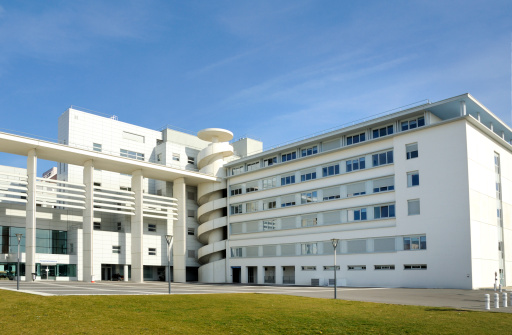 Watford, Hertfordshire, England, UK - August 12th 2023: Modern office building with canopy roof at Croxley Business Park, Hatters Lane, Watford