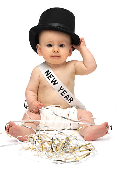 Baby New Year Traditional baby new year with top hat and sash.More Baby New Year and Santa Babies 2009 stock pictures, royalty-free photos & images