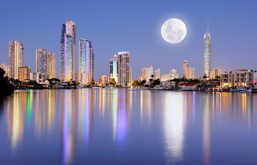 The beautiful Surfers Paradise skyline just after sunset June 2009 as the full moon rises over the city. Shot on Canon 5D MkII.