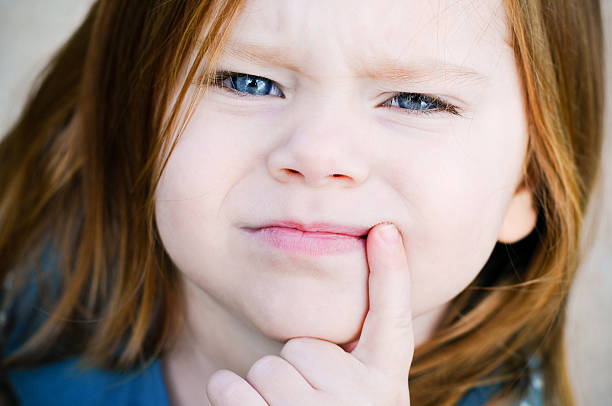 istock Little Girl with Blue Eyes in Deep Thought 173936418