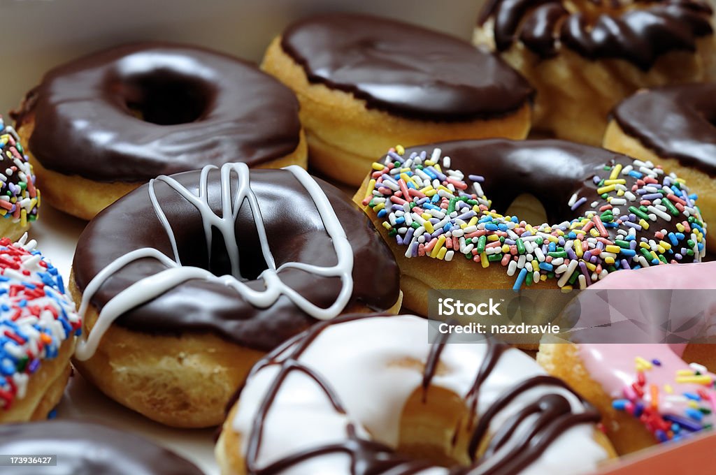 Rosquillas surtidos primer plano - Foto de stock de Buñuelo en forma de rosca libre de derechos