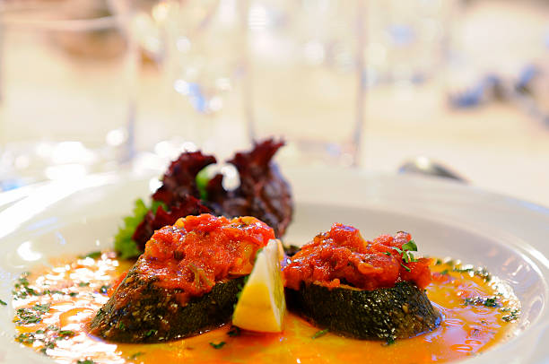 istock Appetizer, zucchini with tomatoes in sauce on china 173936564