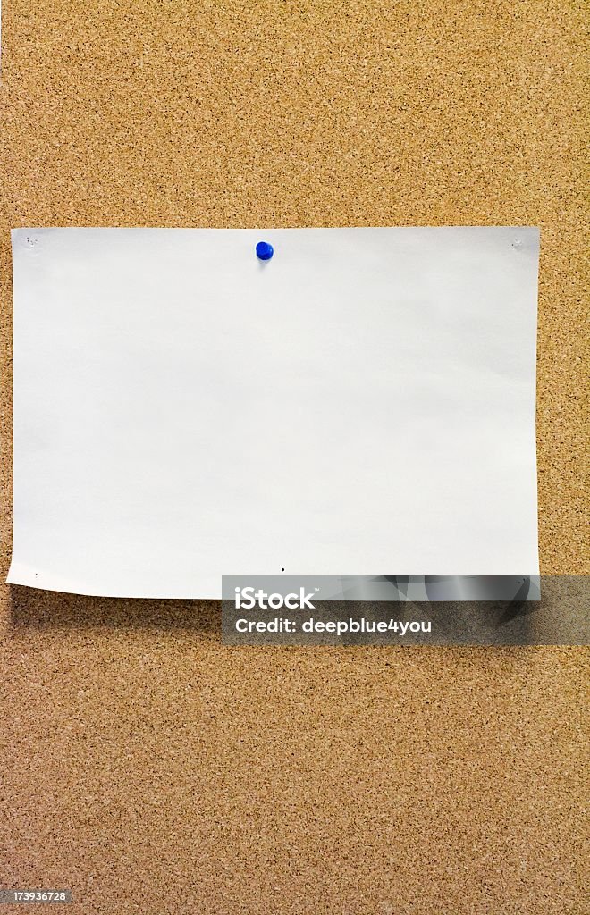 blank white din a4 paper on a cork wall Adhesive Note Stock Photo